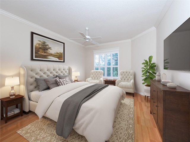 bedroom featuring ornamental molding, ceiling fan, and light hardwood / wood-style flooring