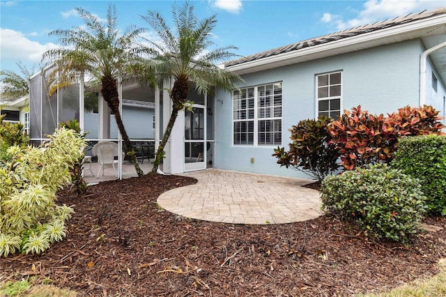 rear view of house with a patio