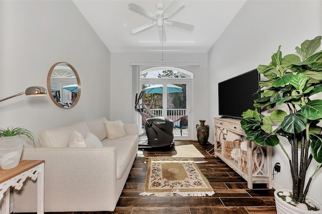 living room featuring ceiling fan, french doors, and vaulted ceiling