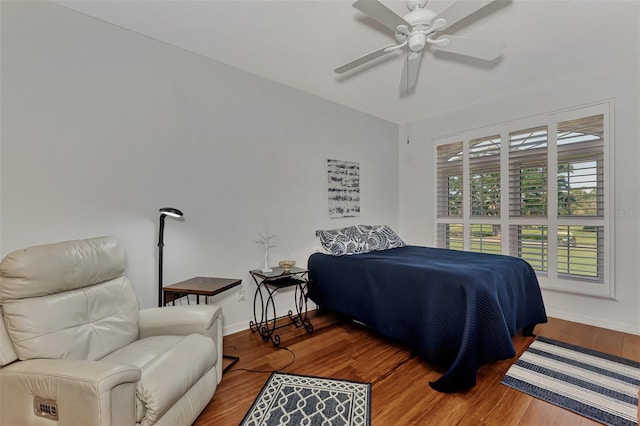 bedroom featuring ceiling fan and wood-type flooring