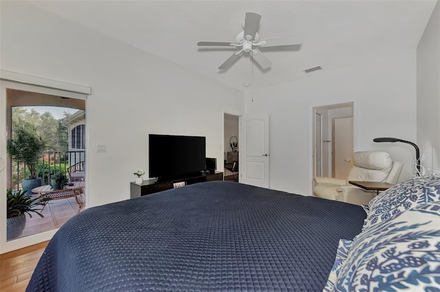 bedroom featuring wood-type flooring, ceiling fan, and access to outside