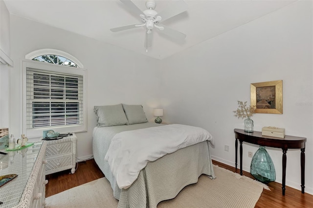 bedroom featuring ceiling fan and hardwood / wood-style floors