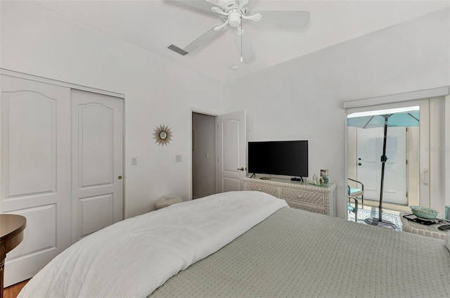 bedroom featuring access to exterior, a closet, and ceiling fan