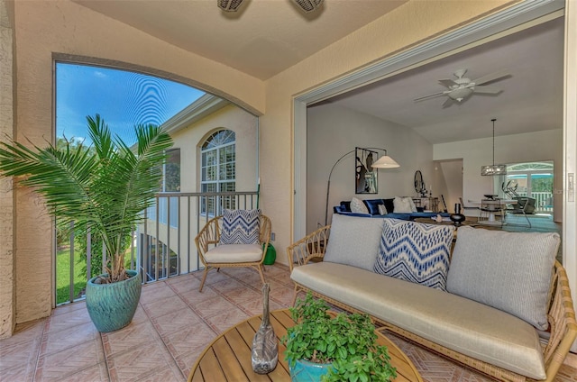 view of patio / terrace featuring ceiling fan