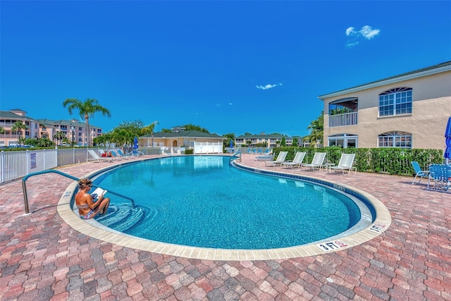 view of swimming pool featuring a patio