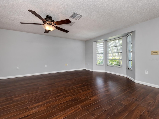 spare room with ceiling fan and a textured ceiling