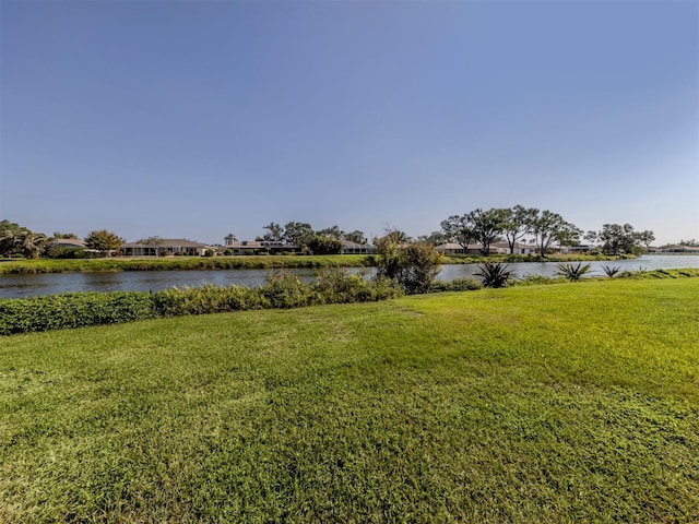 view of yard featuring a water view