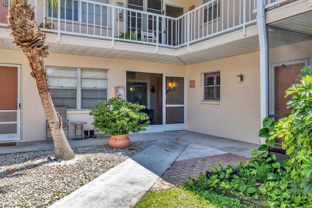 property entrance with a patio