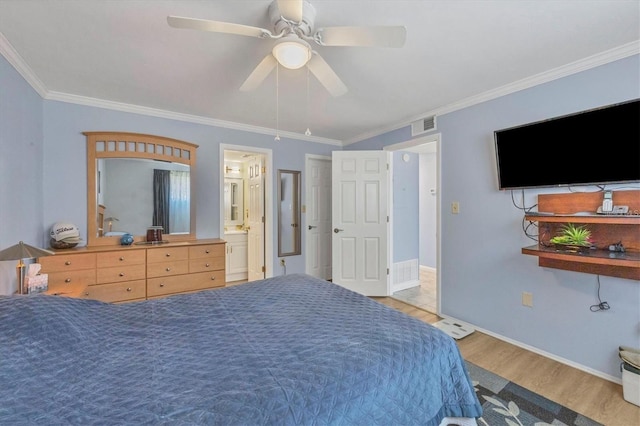 bedroom with ceiling fan, light hardwood / wood-style floors, ensuite bathroom, and crown molding