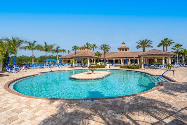 view of pool with a gazebo and a patio