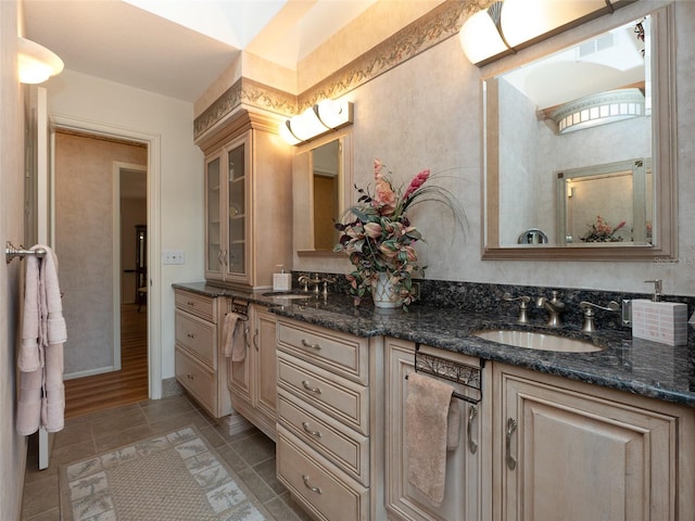 bathroom featuring tile patterned floors and vanity