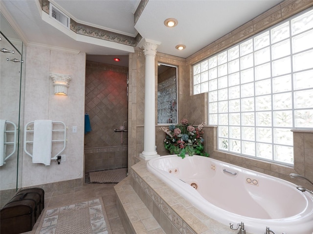 bathroom with decorative columns, separate shower and tub, tile patterned floors, and ornamental molding