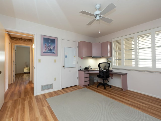 office area with ceiling fan and light wood-type flooring