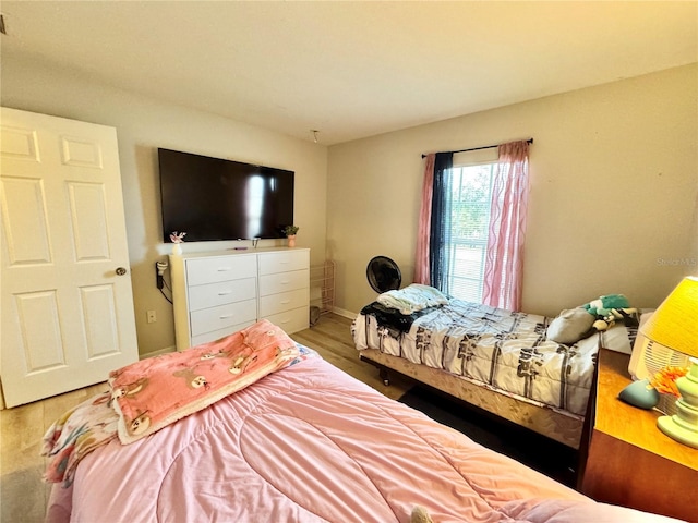 bedroom featuring wood-type flooring