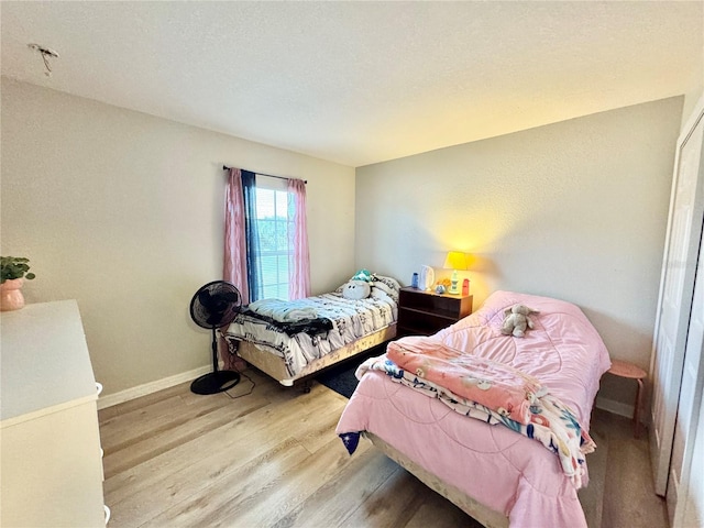 bedroom featuring light hardwood / wood-style flooring