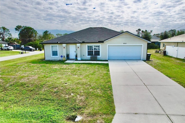 ranch-style house with a garage and a front yard