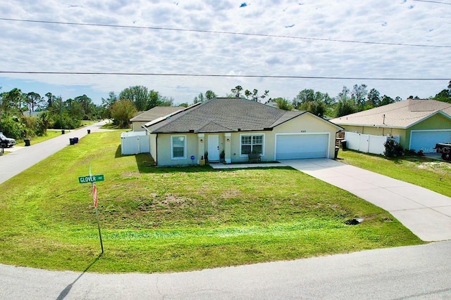 ranch-style house with a garage and a front yard