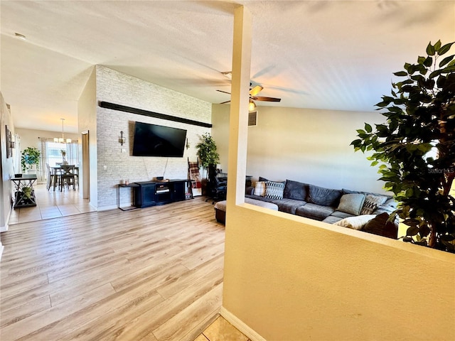 8307 Glover Ave, North Port, FL 34291 - living room with baseboards, a ceiling fan, and wood finished floors