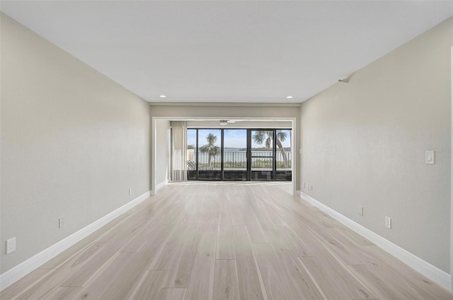 unfurnished room featuring light hardwood / wood-style flooring