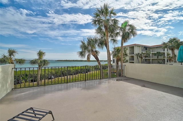 view of patio featuring a water view