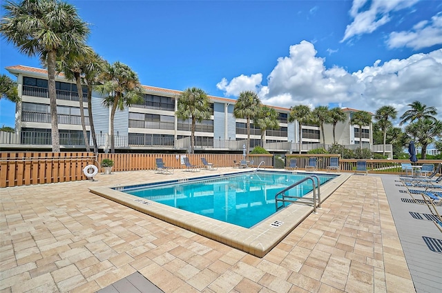 view of swimming pool featuring a patio