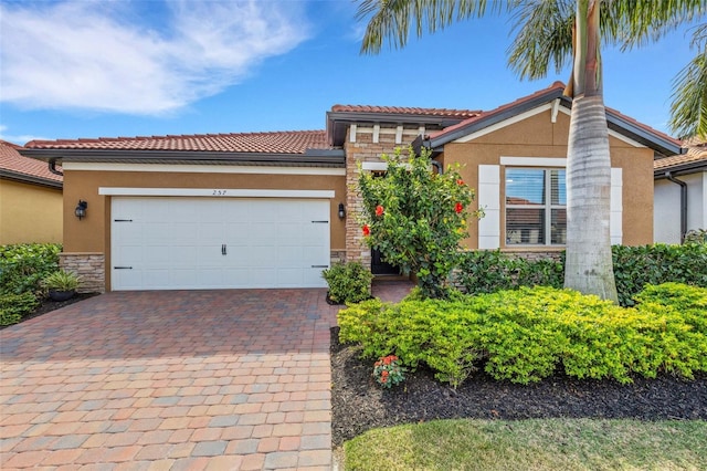 view of front of property with a garage