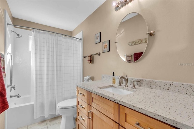 full bathroom featuring tile patterned flooring, toilet, vanity, and shower / bath combo