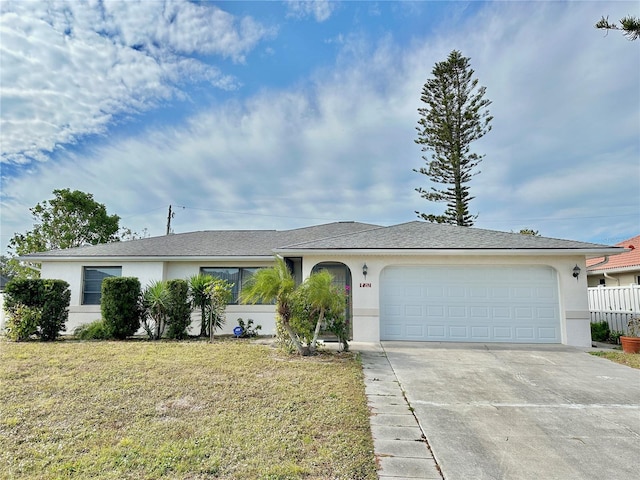 ranch-style house with a front lawn and a garage