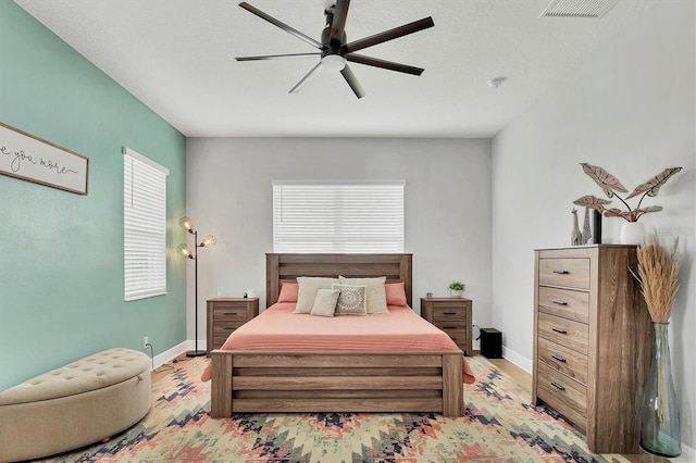 bedroom featuring ceiling fan