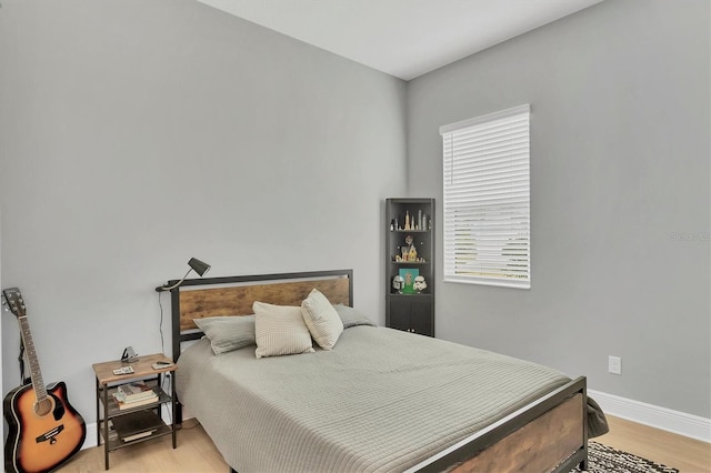 bedroom featuring light hardwood / wood-style floors