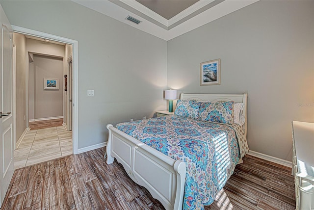 bedroom featuring wood-type flooring