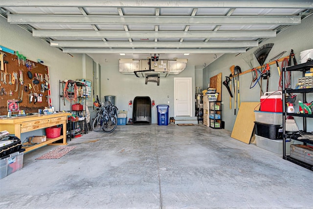 garage with a workshop area