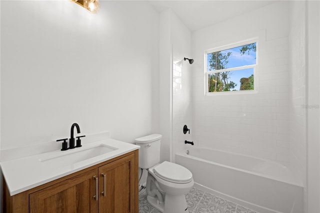 full bathroom featuring toilet, tiled shower / bath combo, and vanity