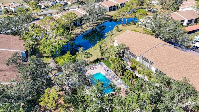 bird's eye view with a water view and a residential view