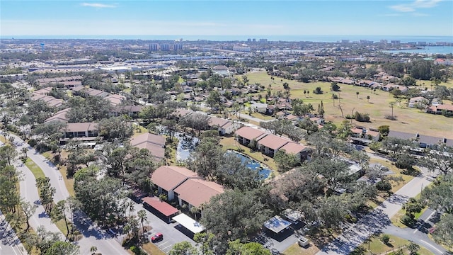 aerial view featuring a residential view and a water view