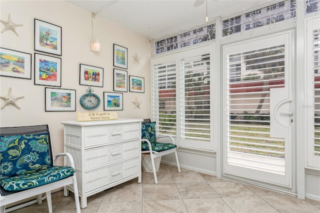 sitting room featuring light tile patterned flooring