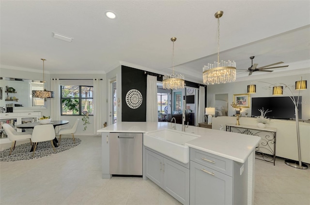 kitchen with dishwasher, sink, ceiling fan with notable chandelier, and an island with sink