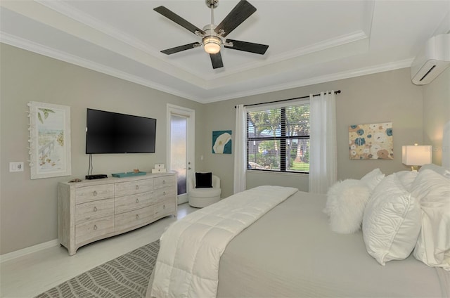 bedroom with a raised ceiling, ornamental molding, a wall mounted AC, and ceiling fan