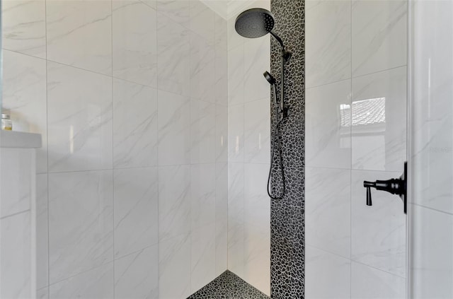 details with a tile shower