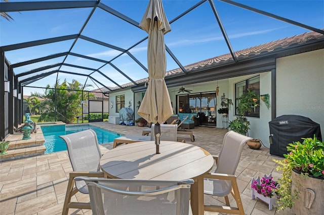 view of patio / terrace featuring a grill, an outdoor hangout area, ceiling fan, and glass enclosure