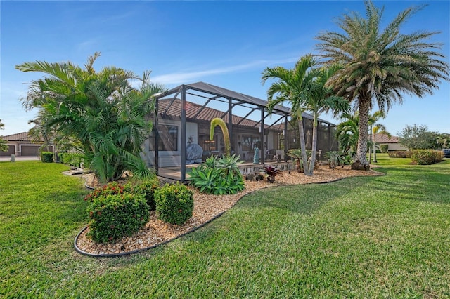 view of yard featuring glass enclosure