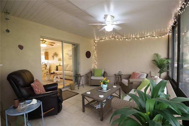 interior space with ceiling fan