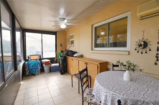 sunroom / solarium with ceiling fan and a wall mounted air conditioner