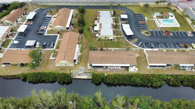 drone / aerial view featuring a water view