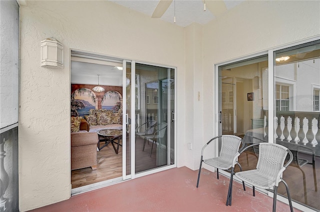 sunroom / solarium with ceiling fan