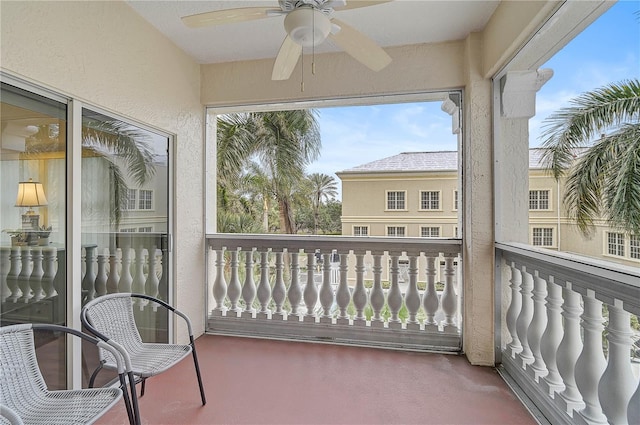 balcony featuring ceiling fan