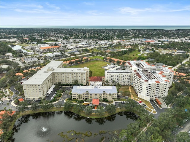 drone / aerial view with a water view