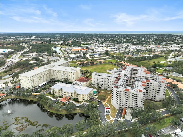 bird's eye view with a water view