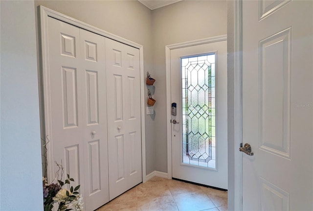 foyer entrance featuring light tile patterned floors