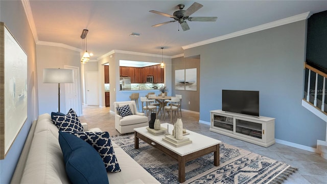 living room with ceiling fan, crown molding, and light tile patterned flooring